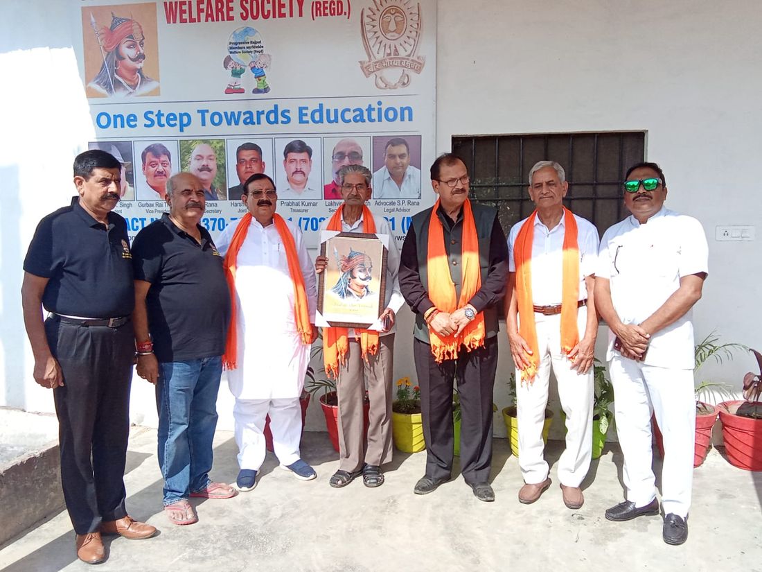 Members presenting an award at a society function