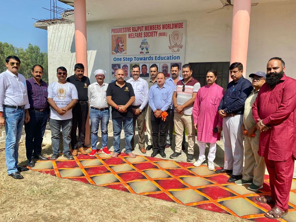 Community gathering outside the society office
