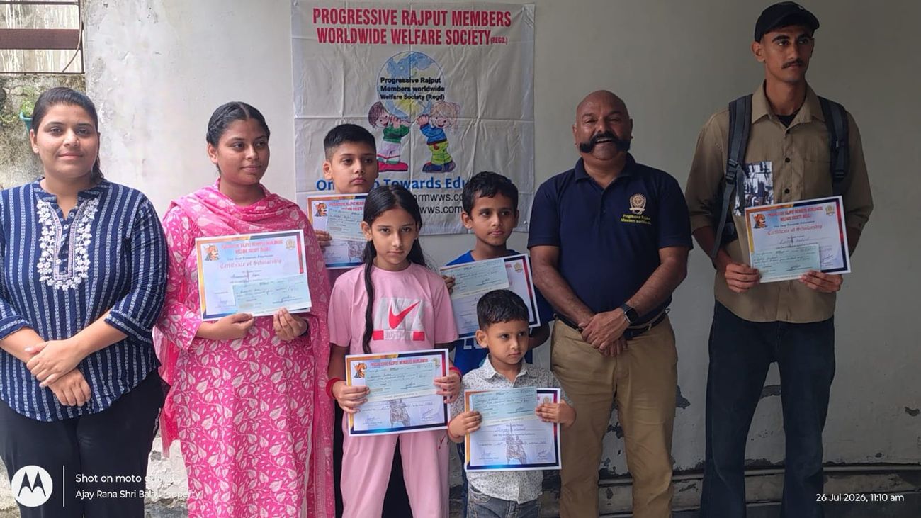 Students with their scholarship certificates, July 2026