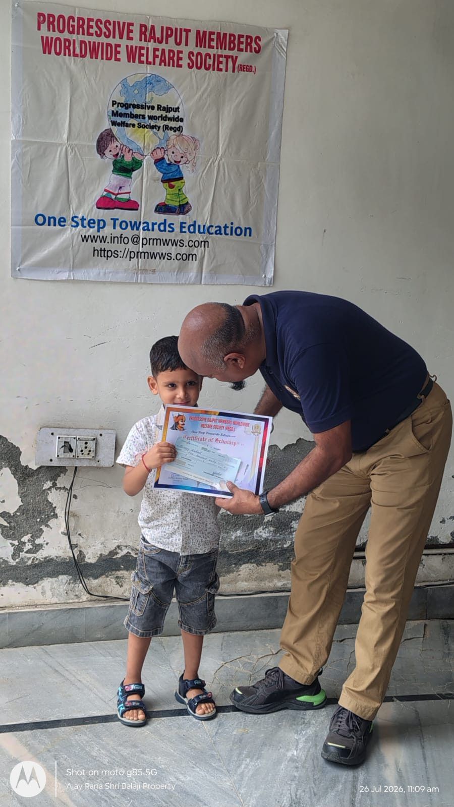 One of the youngest recipients with his certificate